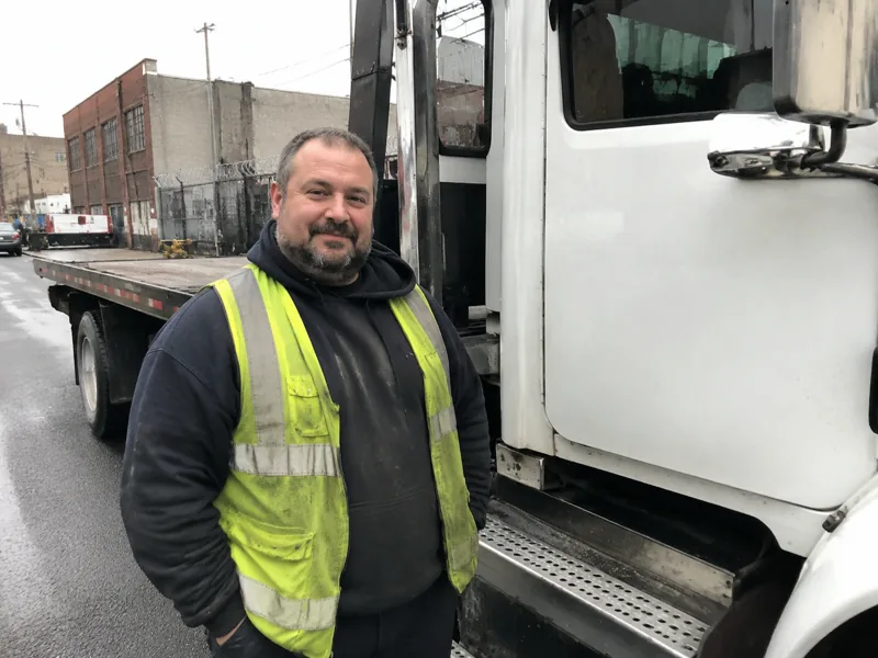 Brick City Towing operator with tow truck in Newark NJ